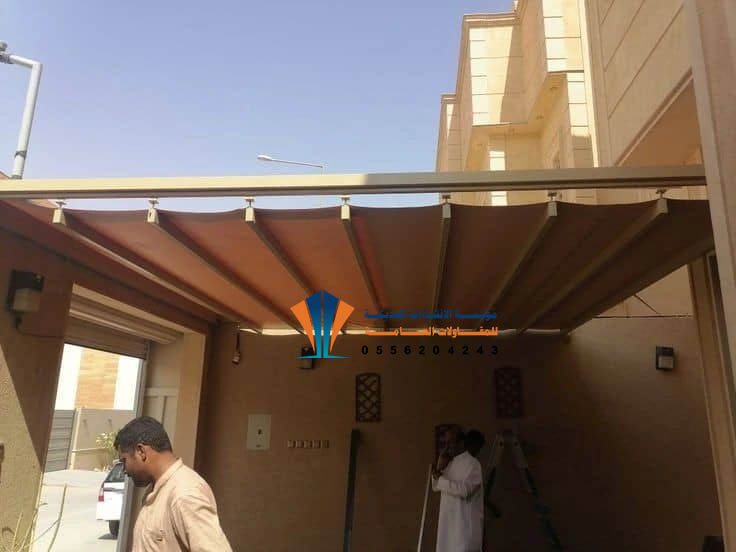 مظلات متحركة يدوية